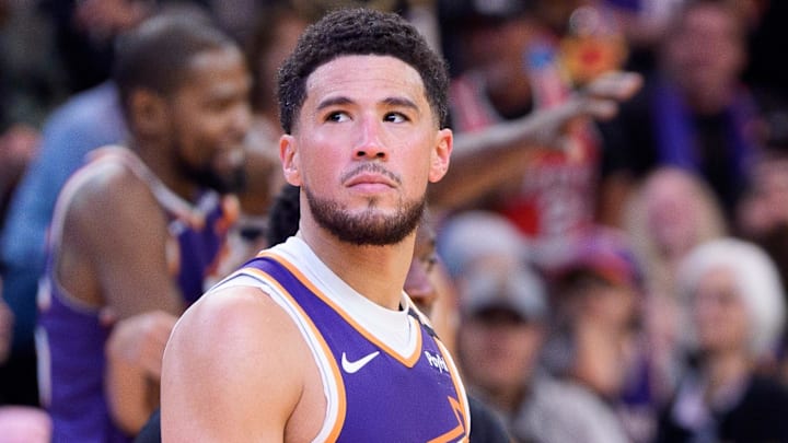 Nov 2, 2024; Phoenix, Arizona, USA;  Phoenix Suns guard Devin Booker (1) reacts after a time out in the second half during a game against the Portland Trail Blazers at Footprint Center. Mandatory Credit: Allan Henry-Imagn Images