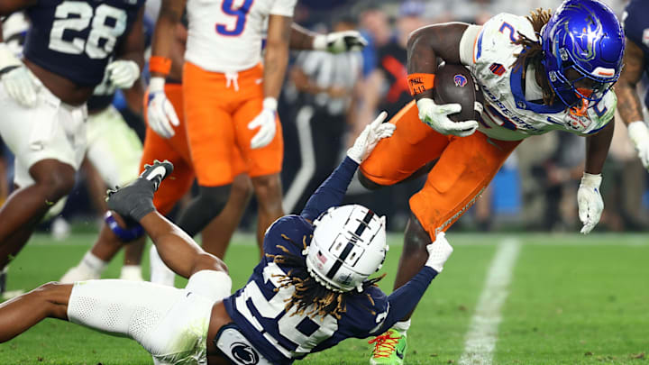 Dec 31, 2024; Glendale, AZ, USA; Boise State Broncos running back Ashton Jeanty (2) rushes the ball against the Penn State Nittany Lions during the second half in the Fiesta Bowl at State Farm Stadium. Dec 31, 2024; Glendale, AZ, USA; Boise State Broncos running back Ashton Jeanty (2) rushes the ball against the Penn State Nittany Lions during the second half in the Fiesta Bowl at State Farm Stadium.