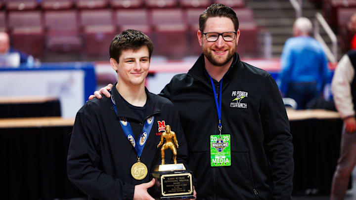 Bishop McCort junior Jax Forrest receives the Robert W. Craig Outstanding Wrestler Award during the PIAA state AA wrestling championships, Saturday, March 8, 2025, at the Giant Center in Hershey.