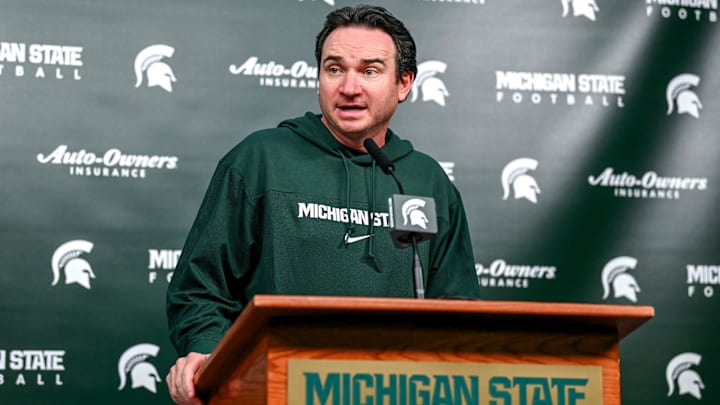 Michigan State coach Jonathan Smith talks the media on the first national signing day for college