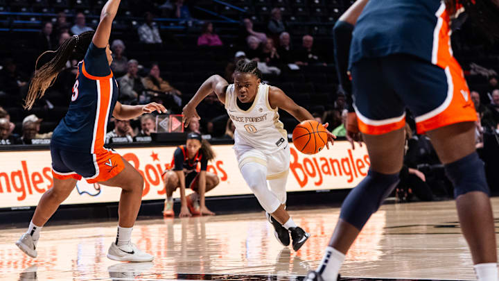 Freshman guard Milan Brown (0) drives to the basket against the Virginia Cavaliers, Jan. 29, 2026. Freshman guard Milan Brown (0) drives to the basket against the Virginia Cavaliers, Jan. 29, 2026.