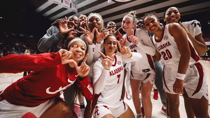 Alabama women's basketball celebrates following its 77-59 win over Troy at Coleman Coliseum. Alabama women's basketball celebrates following its 77-59 win over Troy at Coleman Coliseum.