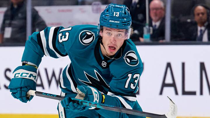 Sep 21, 2025; San Jose, California, USA; San Jose Sharks left wing Quentin Musty (13) skates toward the puck against the Vegas Golden Knights during the second period at SAP Center at San Jose. Mandatory Credit: Robert Edwards-Imagn Images