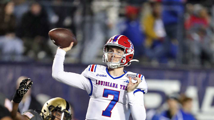 Dec 28, 2024; Shreveport, LA, USA; Louisiana Tech Bulldogs quarterback Evan Bullock (7) throws a pass against the Army Black Knights during the second half of the Radiance Technologies Independence Bowl at Independence Stadium. Mandatory Credit: Danny Wild-Imagn Images