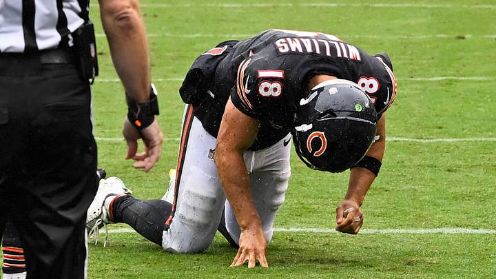 Caleb Williams kneeling after he went down to the set Soldier Field turf with a hamstring injury. Caleb Williams kneeling after he went down to the set Soldier Field turf with a hamstring injury.