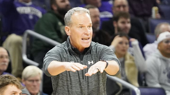 Northwestern Wildcats head coach Chris Collins gestures to his team against the Pepperdine Waves during the first half at Welsh-Ryan Arena.