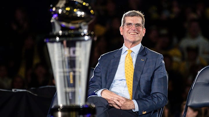 Jim Harbaugh looks on during the Michigan Wolverines' national championship celebration at Crisler