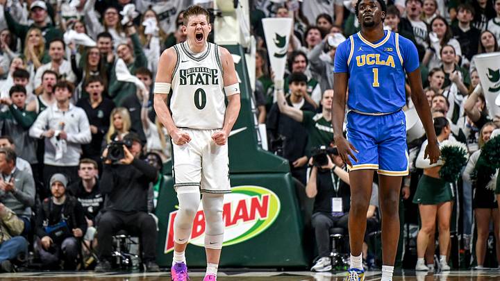 Michigan State's Jaxon Kohler, left, celebrates after making a 3-pointer against UCLA as the Bruins Xavier Booker, right, looks on during the first half on Tuesday, Feb. 17, 2026, at the Breslin Center in East Lansing. Michigan State's Jaxon Kohler, left, celebrates after making a 3-pointer against UCLA as the Bruins Xavier Booker, right, looks on during the first half on Tuesday, Feb. 17, 2026, at the Breslin Center in East Lansing.