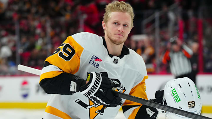Jan 13, 2024; Raleigh, North Carolina, USA;  Pittsburgh Penguins left wing Jake Guentzel (59) looks
