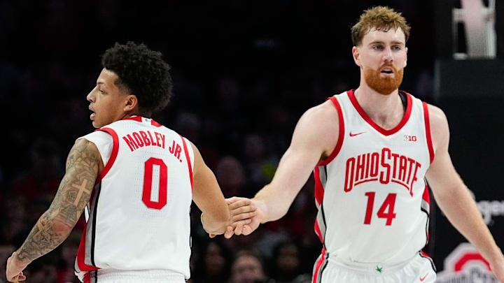 Ohio State Buckeyes guard John Mobley Jr. (0) high-fives forward Brandon Noel (14) in the first half of the NCAA men’s basketball game Value City Arena on Tuesday, Dec. 23, 2025 in Columbus, Ohio.