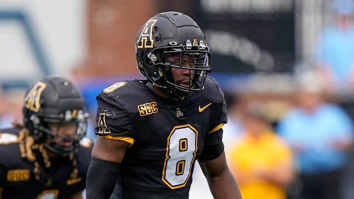 Sep 3, 2022; Boone, North Carolina, USA; Appalachian State Mountaineers linebacker Brendan Harrington (8) during game action between the Appalachian State Mountaineers and the North Carolina Tar Heels at Kidd Brewer Stadium. Mandatory Credit: Jim Dedmon-Imagn Images Sep 3, 2022; Boone, North Carolina, USA; Appalachian State Mountaineers linebacker Brendan Harrington (8) during game action between the Appalachian State Mountaineers and the North Carolina Tar Heels at Kidd Brewer Stadium. Mandatory Credit: Jim Dedmon-Imagn Images