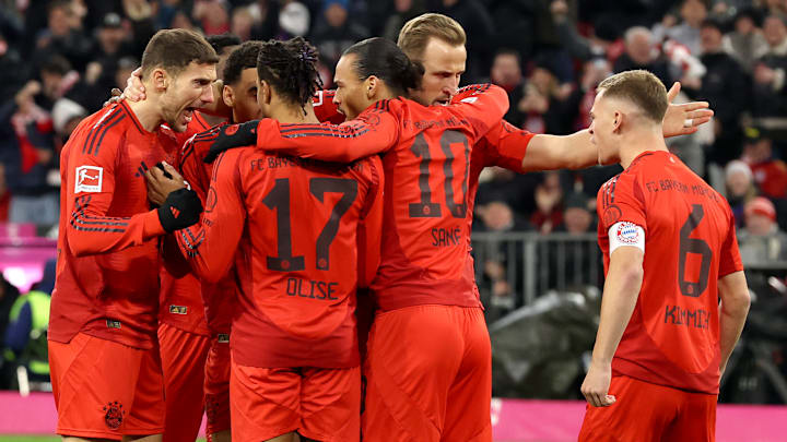 Bayern Munich players celebrating a goal against RB Leipzig.