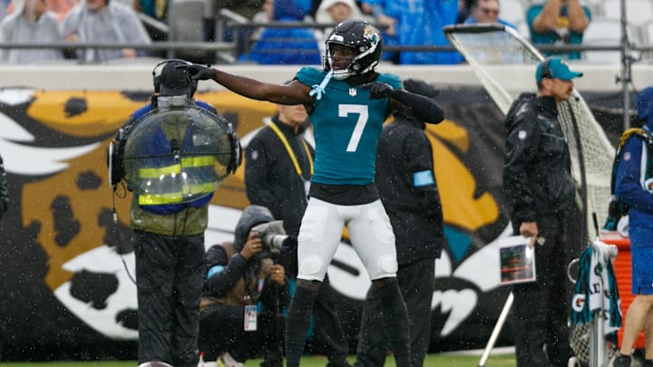 Dec 29, 2024; Jacksonville, Florida, USA; Jacksonville Jaguars wide receiver Brian Thomas Jr. (7) signals first down against the Tennessee Titans during the second quarter at EverBank Stadium. 
