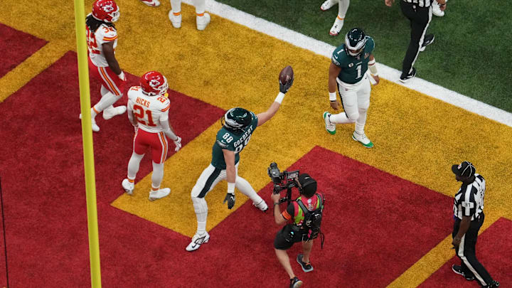 Philadelphia Eagles tight end Dallas Goedert (88) celebrates after a touchdown against the Kansas City Chiefs in the first quarter during Super Bowl LIX at Caesars Superdome. 