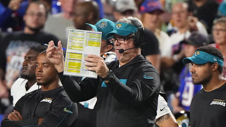Sep 23, 2024; Orchard Park, New York, USA; Jacksonville Jaguars head coach Doug Pederson looks at his play card during the first half against the Buffalo Bills at Highmark Stadium. 