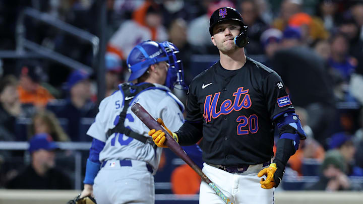 Oct 16, 2024; New York City, New York, USA; New York Mets first base Pete Alonso (20) reacts after striking out against the Los Angeles Dodgers in the first inning during game three of the NLCS for the 2024 MLB playoffs at Citi Field. Mandatory Credit: Brad Penner-Imagn Images