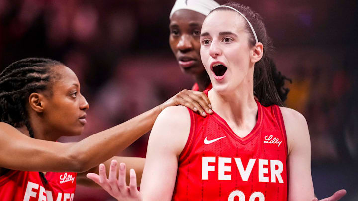 Indiana Fever guard Caitlin Clark (22) reacts to receiving a flagrant foul Saturday, May 17, 2025, during a game between the Indiana Fever and the Chicago Sky at Gainbridge Fieldhouse in Indianapolis. The Indiana Fever defeated the Chicago Sky, 93-58.