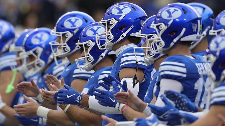 Nov 29, 2025; Provo, Utah, USA; The BYU Cougars warm up before the game against the UCF Knights at LaVell Edwards Stadium. Mandatory Credit: Rob Gray-Imagn Images