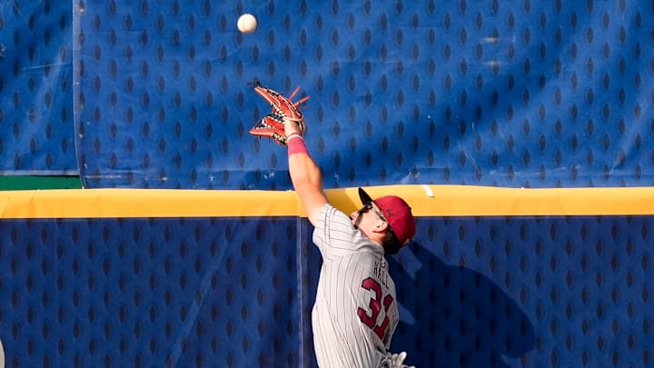 May 20, 2025; Hoover, AL, USA; South Carolina centerfielder Nathan Hall (31) leaps but cannot catch a home run by Florida shortstop Bobby Boser (6) in the first round of the SEC Baseball Tournament at the Hoover Met. May 20, 2025; Hoover, AL, USA; South Carolina centerfielder Nathan Hall (31) leaps but cannot catch a home run by Florida shortstop Bobby Boser (6) in the first round of the SEC Baseball Tournament at the Hoover Met.