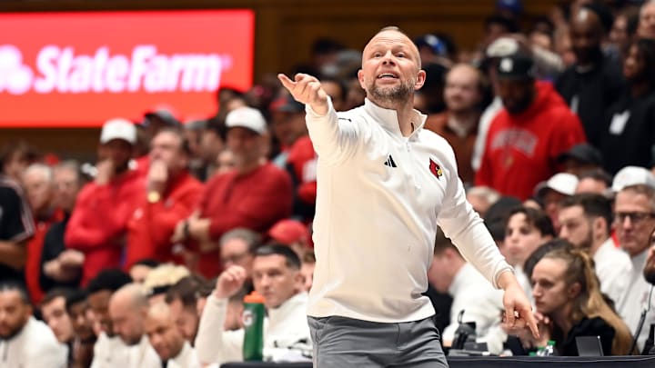 Jan 26, 2026; Durham, North Carolina, USA; Louisville Cardinals head coach Pat Kelsey directs his team during the first half against the Duke Blue Devils at Cameron Indoor Stadium. Mandatory Credit: Rob Kinnan-Imagn Images