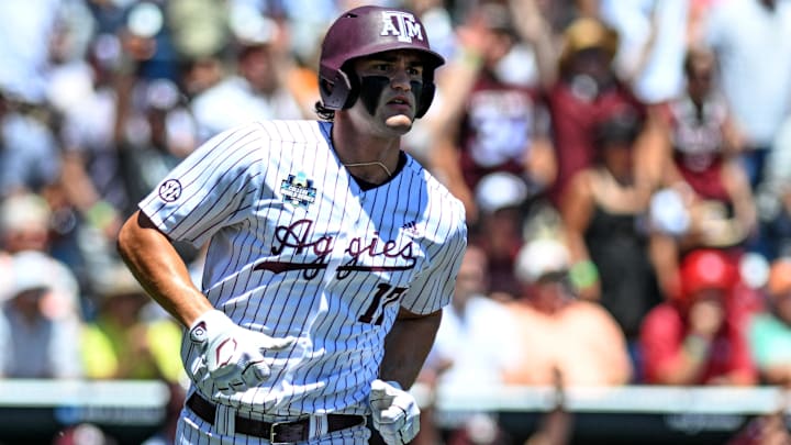 Jun 23, 2024; Omaha, NE, USA; Texas A&M Aggies right fielder Jace Laviolette (17) hits a home run against the Tennessee Volunteers during the first inning at Charles Schwab Field Omaha. Mandatory Credit: Steven Branscombe-Imagn Images Jun 23, 2024; Omaha, NE, USA; Texas A&M Aggies right fielder Jace Laviolette (17) hits a home run against the Tennessee Volunteers during the first inning at Charles Schwab Field Omaha. Mandatory Credit: Steven Branscombe-Imagn Images