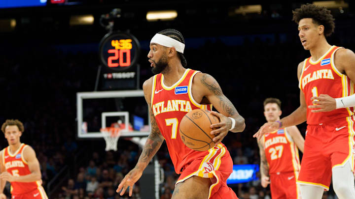 Nov 16, 2025; Phoenix, Arizona, USA; Atlanta Hawks guard Nickeil Alexander-Walker (7) drives against the Phoenix Suns during the second half of play at Mortgage Matchup Center. Mandatory Credit: Allan Henry-Imagn Images