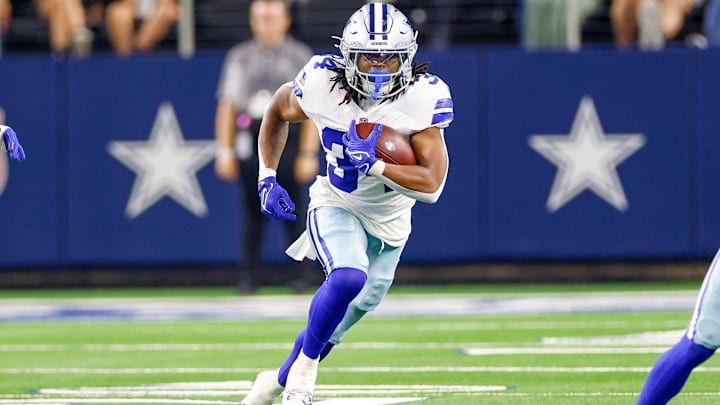 Dallas Cowboys running back Jaydon Blue carries the ball during the fourth quarter against the Atlanta Falcons.