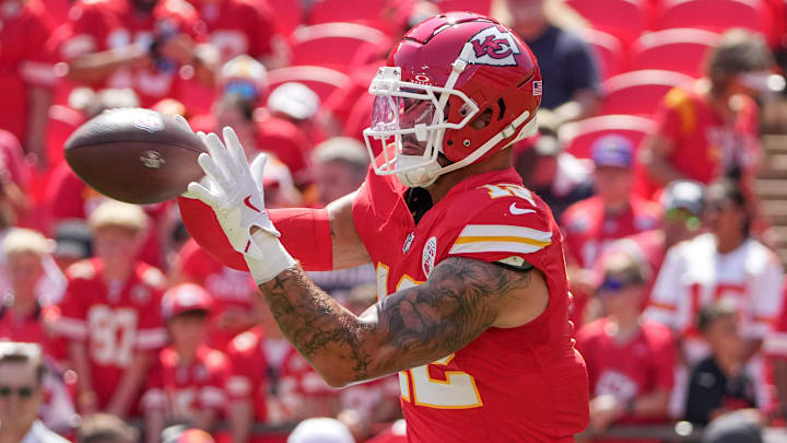 Aug 17, 2024; Kansas City, Missouri, USA; Kansas City Chiefs tight end Jared Wiley (12) warms up against the Detroit Lions prior to the game at GEHA Field at Arrowhead Stadium. Mandatory Credit: Denny Medley-Imagn Images