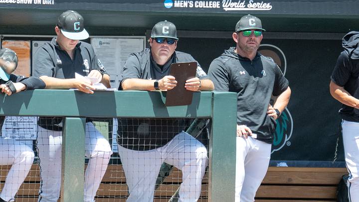 Jun 22, 2025; Omaha, Neb, USA; Coastal Carolina Chanticleers head coach Kevin Schnall (9) (right) watches action against the LSU Tigers during the first inning at Charles Schwab Field. Mandatory Credit: Steven Branscombe-Imagn Images Jun 22, 2025; Omaha, Neb, USA; Coastal Carolina Chanticleers head coach Kevin Schnall (9) (right) watches action against the LSU Tigers during the first inning at Charles Schwab Field. Mandatory Credit: Steven Branscombe-Imagn Images