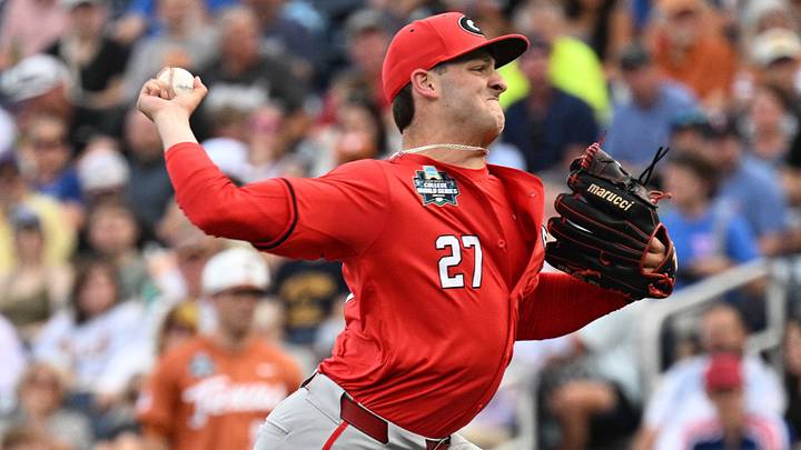 Jun 16, 2026; Omaha, NE, USA;  Georgia Bulldogs starting pitcher Dylan Vigue (27) throws against the Texas Longhorns during the first inning at Charles Schwab Field. Mandatory Credit: Steven Branscombe-Imagn Images