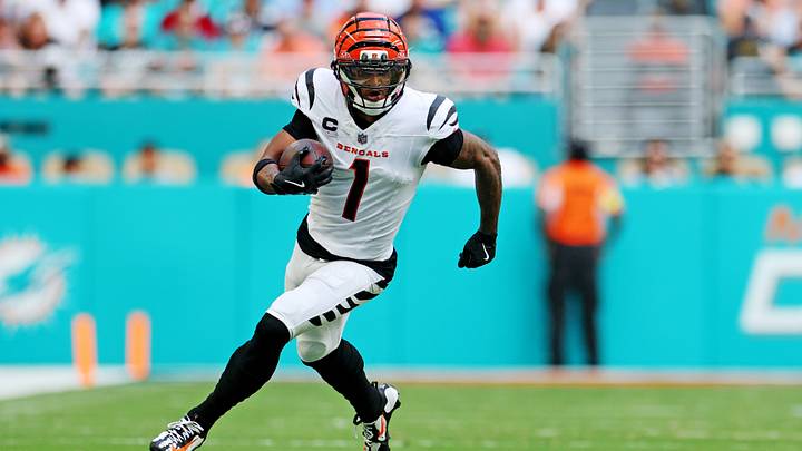 Cincinnati Bengals receiver Ja'Marr Chase (1) runs the ball during the second quarter against the Cincinnati Bengals at Hard Rock Stadium. Cincinnati Bengals receiver Ja'Marr Chase (1) runs the ball during the second quarter against the Cincinnati Bengals at Hard Rock Stadium.