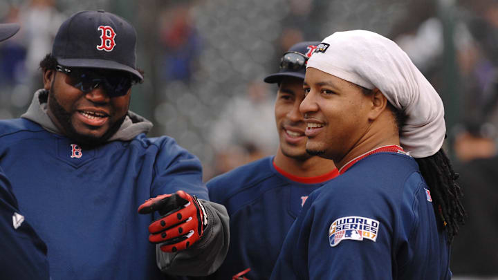 Oct 27, 2007; Denver, CO, USA; Boston Red Sox first baseman David Ortiz (left) talks with teammates Julio Lugo (center) and Manny Ramirez prior to the game against the Colorado Rockies in game 3 of the 2007 World Series at Coors Field. Mandatory Credit: Mark J. Rebilas-Imagn Images Oct 27, 2007; Denver, CO, USA; Boston Red Sox first baseman David Ortiz (left) talks with teammates Julio Lugo (center) and Manny Ramirez prior to the game against the Colorado Rockies in game 3 of the 2007 World Series at Coors Field. Mandatory Credit: Mark J. Rebilas-Imagn Images