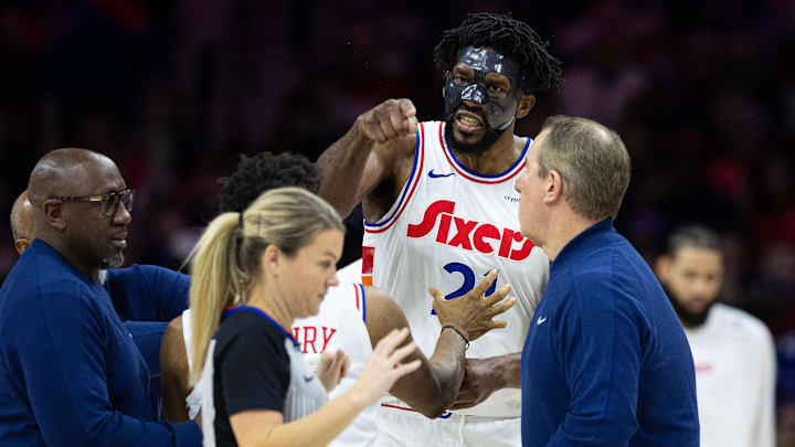 Philadelphia 76ers center Joel Embiid argues with  referee Jenna Schroeder and is ejected on a second technical foul.