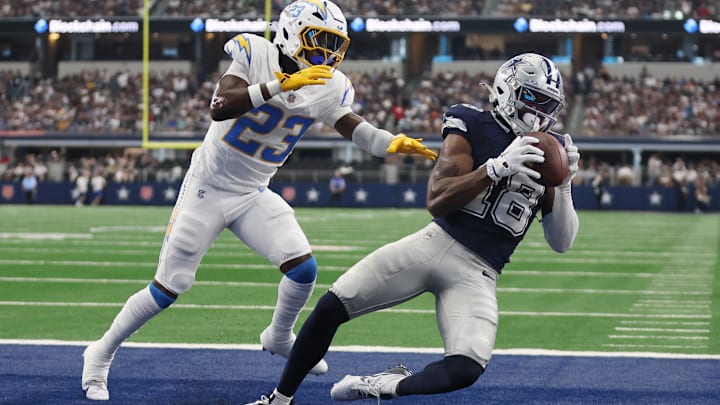 Dallas Cowboys wide receiver Ryan Flournoy catches a touchdown pass against Los Angeles Chargers cornerback Matt Hankins. Dallas Cowboys wide receiver Ryan Flournoy catches a touchdown pass against Los Angeles Chargers cornerback Matt Hankins.