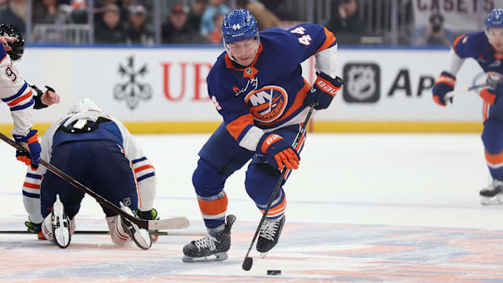 Mar 14, 2025; Elmont, New York, USA; New York Islanders center Jean-Gabriel Pageau (44) skates with the puck against the Edmonton Oilers during overtime at UBS Arena. Mandatory Credit: Thomas Salus-Imagn Images