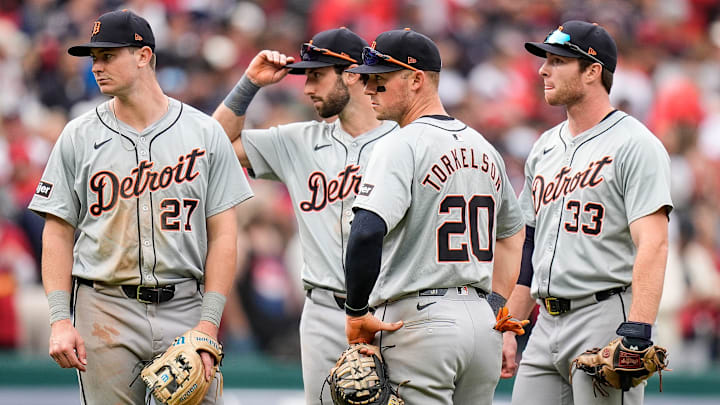 From left, Detroit Tigers shortstop Trey Sweeney (27), third baseman Matt Vierling (8), first baseman Spencer Torkelson (20) and second base Colt Keith (33) watch during a pitching change during the seventh inning at Game 5 of ALDS at Progressive Field in Cleveland, Ohio on Saturday, Oct. 12, 2024.