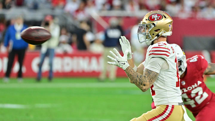 Jan 5, 2025; Glendale, Arizona, USA;  San Francisco 49ers wide receiver Ricky Pearsall (14) catches a pass in the second half against the Arizona Cardinals at State Farm Stadium. Mandatory Credit: Matt Kartozian-Imagn Images
