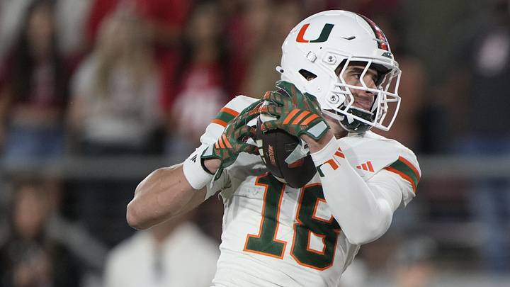 Sep 4, 2026; Stanford, California, USA;  Miami Hurricanes wide receiver Cooper Barkate (18) makes a touchdown reception against the Stanford Cardinal during the third quarter at Stanford Stadium.  Mandatory Credit: Stan Szeto-Imagn Images