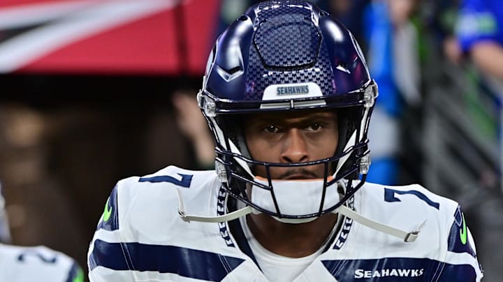 Jan 7, 2024; Glendale, Arizona, USA; Seattle Seahawks quarterback Geno Smith (7) takes the field