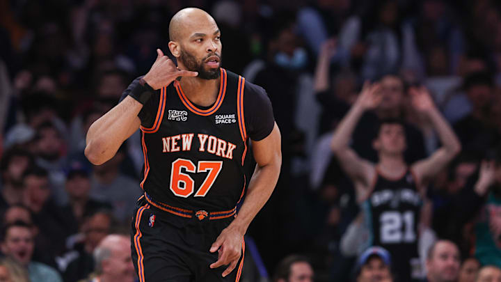 Mar 22, 2022; New York, New York, USA; New York Knicks center Taj Gibson (67) reacts after a basket against the Atlanta Hawks during the first half at Madison Square Garden. Mandatory Credit: Vincent Carchietta-Imagn Images