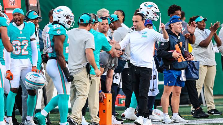 Miami Dolphins head coach Jeff Hafley celebrates with his team after a fourth down conversion during the fourth quarter to secure the win versus the New York Jets at MetLife Stadium. Miami Dolphins head coach Jeff Hafley celebrates with his team after a fourth down conversion during the fourth quarter to secure the win versus the New York Jets at MetLife Stadium.