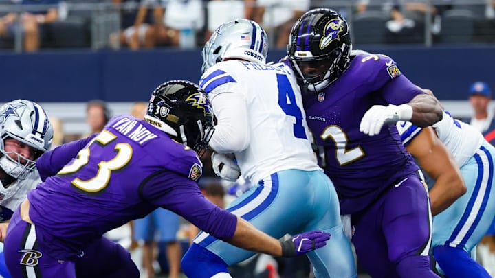Sep 22, 2024; Arlington, Texas, USA;  Baltimore Ravens defensive tackle Nnamdi Madubuike (92) and Baltimore Ravens linebacker Kyle Van Noy (53) tackle Dallas Cowboys quarterback Dak Prescott (4) during the first half at AT&T Stadium. Mandatory Credit: Kevin Jairaj-Imagn Images