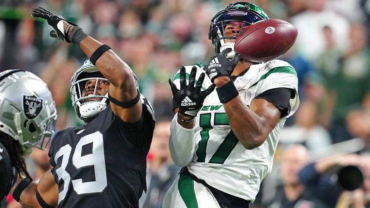 Nov 12, 2023; Paradise, Nevada, USA; New York Jets wide receiver Garrett Wilson (17) misses a reception as Las Vegas Raiders cornerback Nate Hobbs (39) defends on the play during the fourth quarter at Allegiant Stadium. Mandatory Credit: Stephen R. Sylvanie-USA TODAY Sports