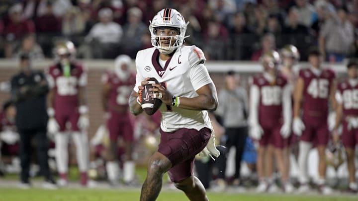 Nov 15, 2025; Tallahassee, Florida, USA; Virginia Tech Hokies quarterback Kyron Drones (1) looks to pass during the second half against the Florida State Seminoles at Doak S. Campbell Stadium. Mandatory Credit: Melina Myers-Imagn Images