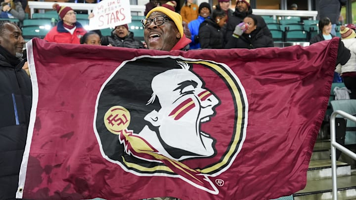 Dec 5, 2025; Kansas City, MO, USA; A Florida State Seminoles fan cheers after defeating the Texas Christian University Horned Frogs in a 2025 NCAA Women’s College Cup semifinal match at CPKC Stadium. Mandatory Credit: Jay Biggerstaff-Imagn Images