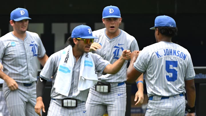 Jun 8, 2025; Durham, NC, USA; The Duke Blue Devils dugout reacts to Duke outfielder and pitcher Kyle Johnson's (5) pitching performance in the first inning against Murray State.