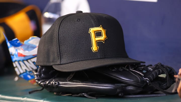 Sep 8, 2023; Atlanta, Georgia, USA; A detailed view of a Pittsburgh Pirates hat and glove before a game against the Pittsburgh Pirates in the first inning at Truist Park. Mandatory Credit: Brett Davis-Imagn Images Sep 8, 2023; Atlanta, Georgia, USA; A detailed view of a Pittsburgh Pirates hat and glove before a game against the Pittsburgh Pirates in the first inning at Truist Park. Mandatory Credit: Brett Davis-Imagn Images