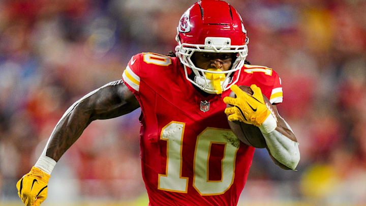 Oct 12, 2025; Kansas City, Missouri, USA; Kansas City Chiefs running back Isiah Pacheco (10) runs the ball during the first half against the Detroit Lions at GEHA Field at Arrowhead Stadium. 