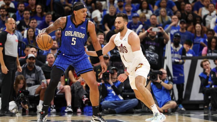 Apr 27, 2024; Orlando, Florida, USA; Orlando Magic forward Paolo Banchero (5) drives to the basket