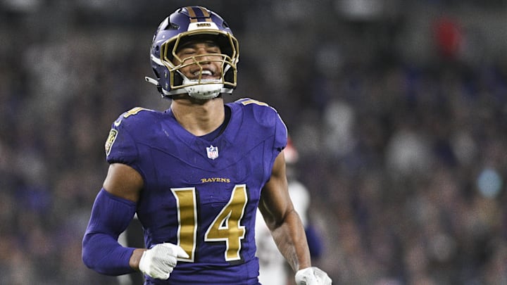 Nov 7, 2024; Baltimore, Maryland, USA; Baltimore Ravens safety Kyle Hamilton (14) reacts after tips a Cincinnati Bengals quarterback Joe Burrow (9) pass during the first quarter  at M&T Bank Stadium. Mandatory Credit: Tommy Gilligan-Imagn Images